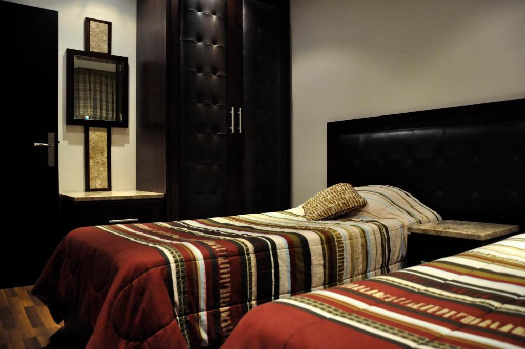 Granada Suites Hotel Amman Oda fotoğraf